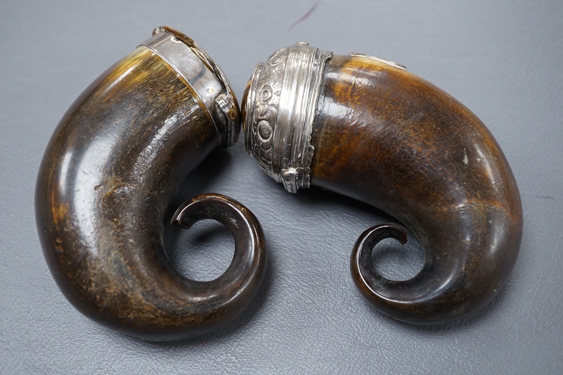 Two 19th century white metal mounted horn snuff mulls, one engraved 'John Calder', the other with inset tiger's eye quartz cabochon, both a.f., largest 83mm.